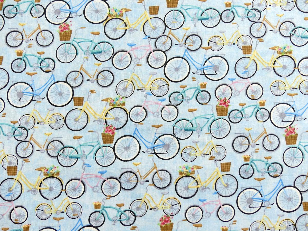 Patchworkstoff mit vielen bunten Fahrrädern
